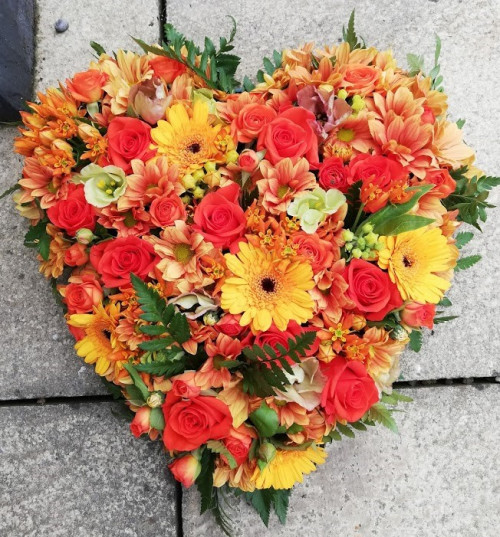 Orange flowers in a padded heart